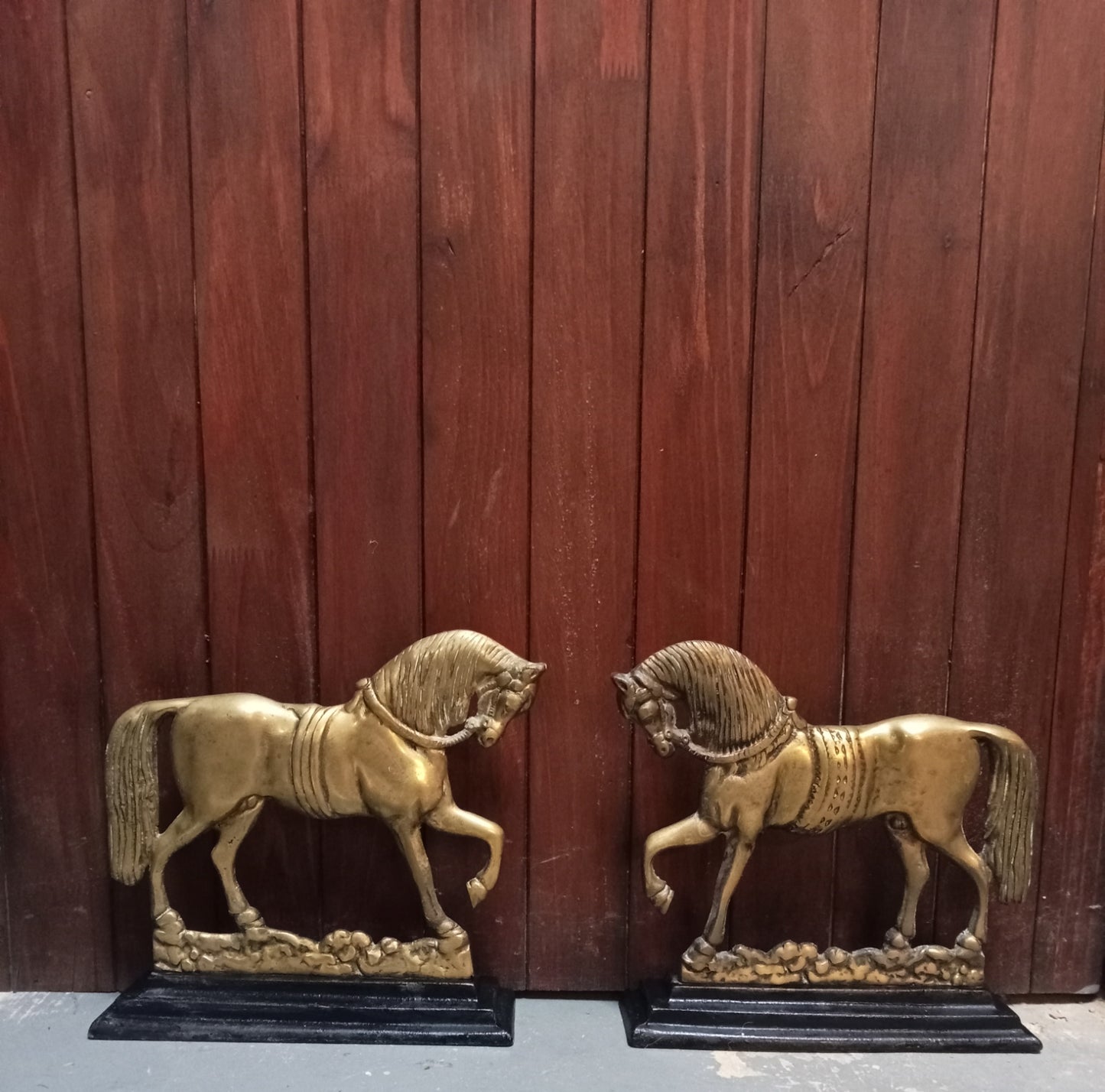 Brass horse on cast iron base doorstoppers