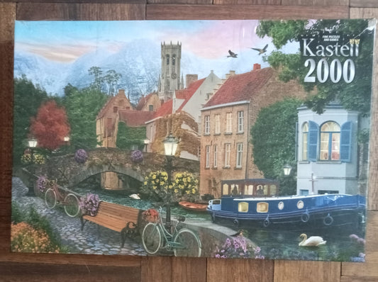Kastell 2000 puzzle with a scenic village design.